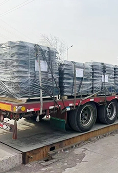 Shipment Ready: Palletized Cargo on Flatbed Trailer Shipment Ready: Palletized Cargo on Flatbed Trailer