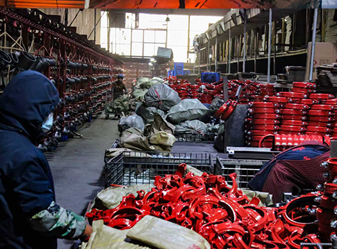 How should malleable iron parts be protected against corrosion?